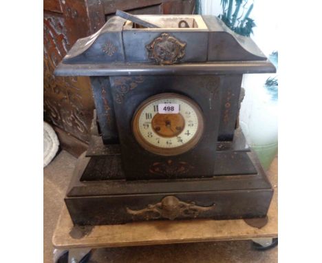 A large late Victorian black slate cased mantel clock of architectural design with eight day gong striking movement - case da