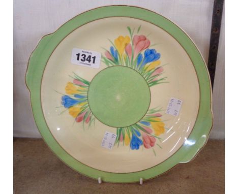 A Royal Staffordshire Clarice Cliff Crocus plate with hand painted decoration