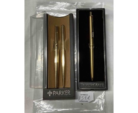 A 1981 display cased Parker cartridge fountain pen and matching roller ball pen with gold plated finish, easel back, paperwor