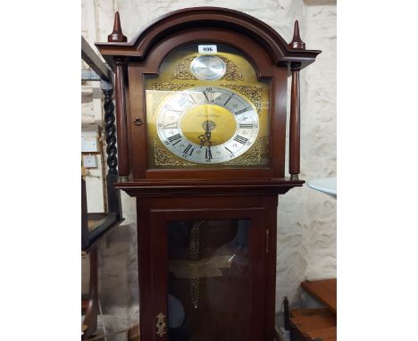 A 20th Century mahogany longcase clock, the 27cm arched dial marked for retailer Richard Broad of Bodmin with glazed door to 