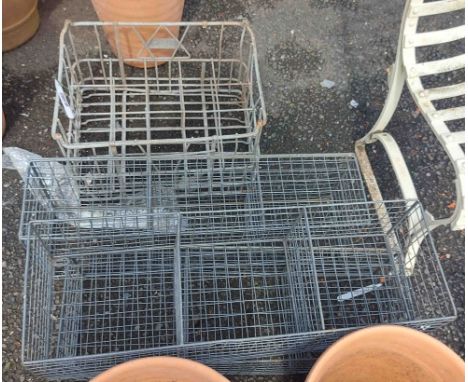 A vintage metal milk crate - sold with three metal storage baskets