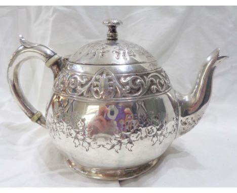 A small Victorian silver globular teapot with embossed floral swag and scroll decoration by Henry Wilkinson &amp; Co. - Londo