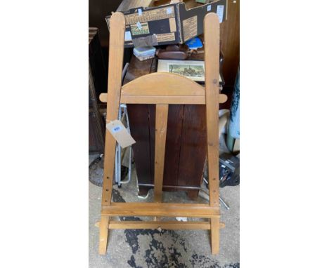 A vintage wooden artist's easel