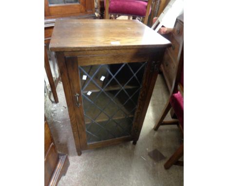 A 55cm vintage Webber Furniture oak hi-fi cabinet with leaded glazed panel door