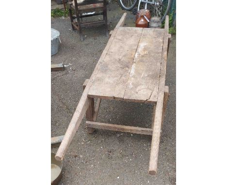 A vintage wooden pig trestle
