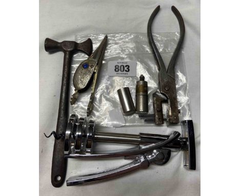 A bag containing a quantity of metalware including corkscrew, toffee hammer, etc.