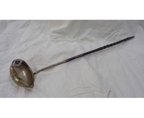 A Georgian London silver toddy ladle with twisted whale bone handle by Thomas Morely