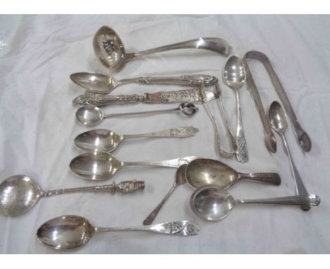 A bag containing a quantity of small English silver cutlery items - sold with a Dutch silver sifter ladle and a plated knife 