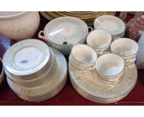 A quantity of Royal Worcester bone china tableware, decorated in the Allegro pattern, including tureen (lid a/f), soup bowls 