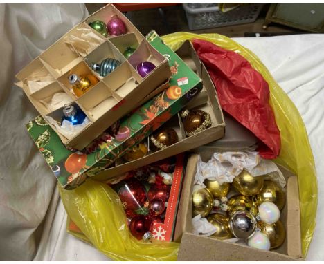 A bag containing a quantity of vintage Christmas decorations