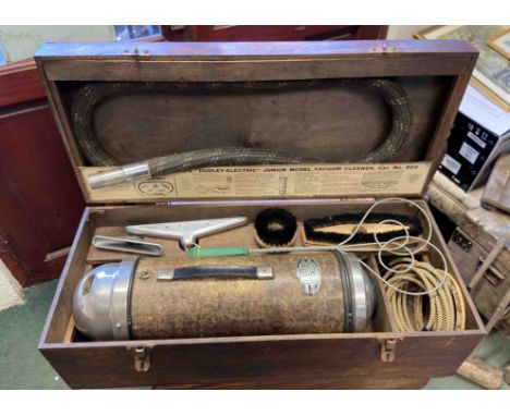 A vintage cased Dudley electric junior cleaner