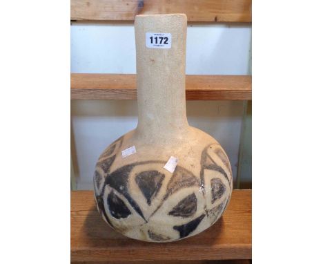 A large vintage Studio Pottery vase of bottle form with painted geometric pattern