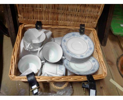 A small wicker hamper containing a quantity of Noritake teaware
