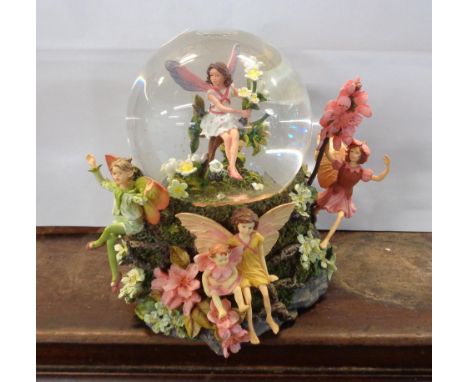 A Danbury Mint Flower Fairies snow globe