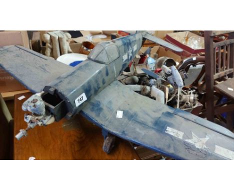 A model of an F4U Corsair plane, with petrol engine - for restoration - sold with spare parts