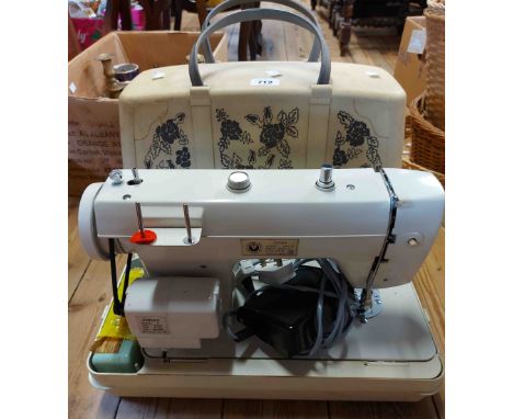 A vintage cased Jones model 461-2 sewing machine