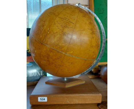 A vintage Philips Challenge globe on wooden stand