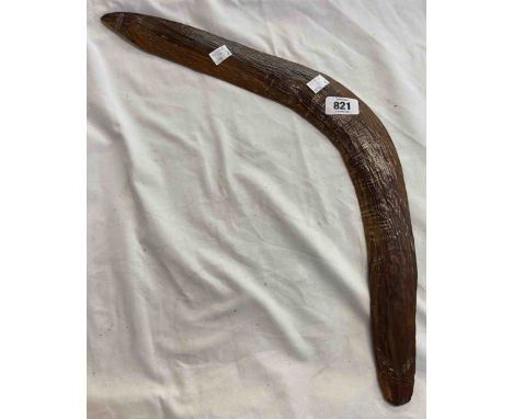 A hand carved Australian Aboriginal hunting boomerang