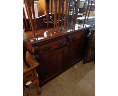 A 1.22m late Victorian stained walnut chiffonier with later added pierced raised back, two frieze drawers and pair of panelle