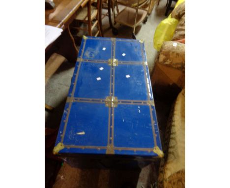 A 90cm vintage travelling trunk with brass mounts and blue finish