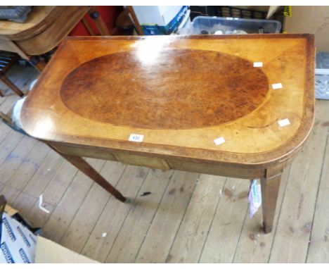 A 92cm 19th Century amboyna veneered and strung fold-over card table with green baise lined interior and double gated action,