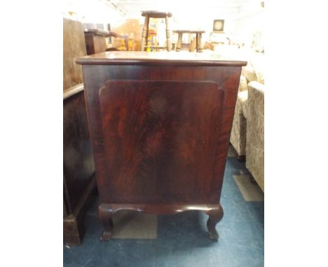 A Victorian Mahogany Bedroom Cabinet with Panel Door and Single Inner Drawer on Short Cabriole Legs.  