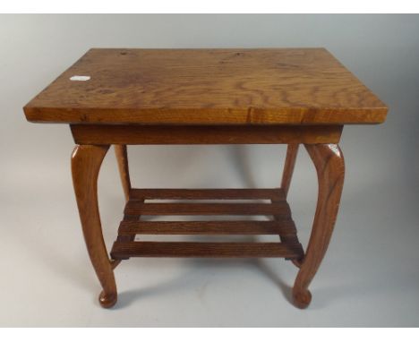 A Small Oak Stool with Stretcher Shelf.