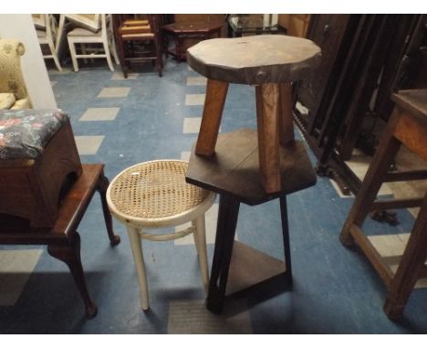 An Oak Cane Topped Stool Together with Elm Three Legged Stool and Oak Tripod Table.