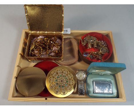 A Collection of Costume Jewellery, Powder Compacts, Cigarette Lighter Etc. 