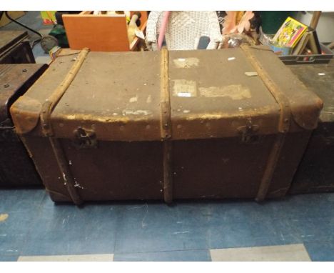 A Canvas Covered Wooden Travelling Trunk. 
