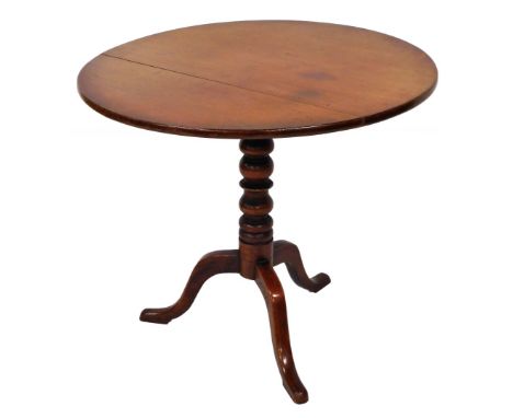An early 19thC mahogany tilt top table, on bobbin turned supports, on tripod base, 73cm high, 83cm diameter. 