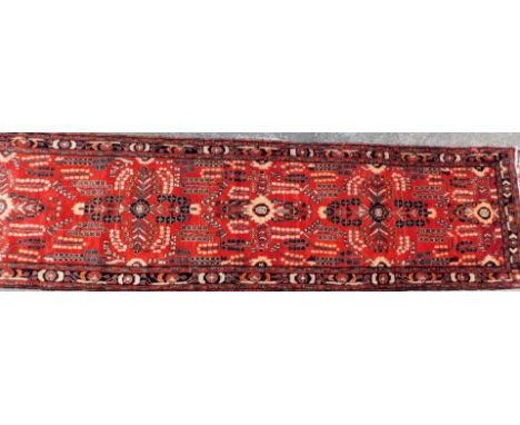 A large Persian Suruk runner, large full pile, 400cm x 103cm. 