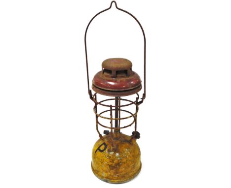 A Tilly lamp, with painted base bearing the initial P, paraffin heated with carrying handle, 53cm high.