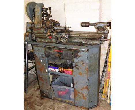 A Myford lathe and stand, together with various cutting tools. Buyer Note: WARNING! This lot contains untested or unsafe elec