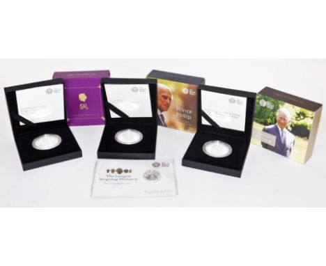 Four Royal Mint collectors coins, to include a portrait of a Prince, Prince Philip Not For Himself But For His Country, I Glo