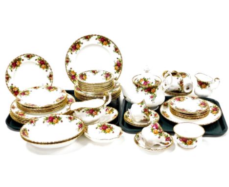 A Royal Albert Royal Country Roses part tea and dinner service, comprising gravy boat and saucer, soup bowls, side bowl, serv