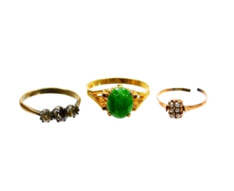 Three dress rings, to include a gold and seed pearl set dress ring, cut yellow metal unmarked, 0.7g, a silver and paste stone