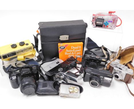 A group of cameras, cases, straps and accessories, to include a waterproof camera, a Nikon AWAF camera, a Silette Prontor-SVS