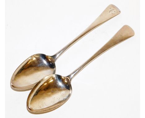 Two silver serving spoons, each of similar design, with Fiddle pattern end, one bearing the initial C, London 1779 and 1801, 