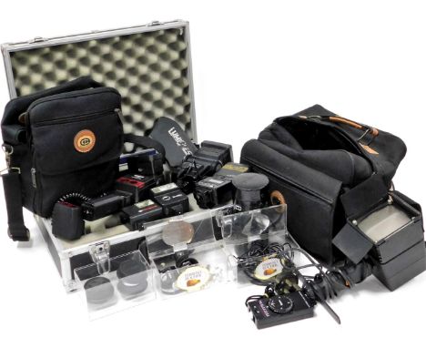 Various camera equipment, to include Ferguson video flash, lens cases, cables, carry case, etc. (a quantity) 