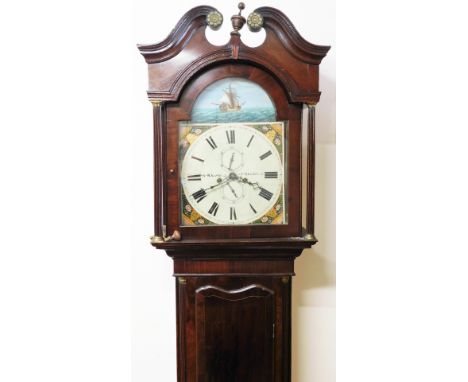 S. Wherly South Shields. A George III mahogany longcase clock, with arched pediment top set with brass sundial decoration, wi