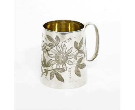 A Victorian silver child's tankard, heavily engine turned with flowers, bearing the initial WEAH, makers stamp JTH, London 18