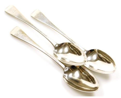 Three George IV silver Old English pattern serving spoons by William Bateman, with a lion rampant crest to top, London 1828, 