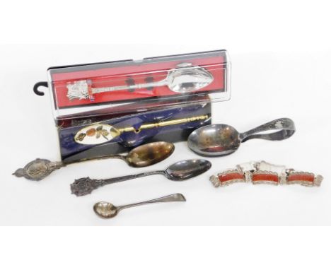 A group of silver and metal wares, to include two silver souvenir spoons, a plated caddy spoon, silver mustard spoon, silver 