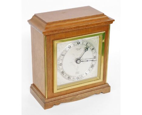 An Elliot Payne and Son of Oxford mahogany cased mantel clock, with silver coloured squared dial, with floral engraving, 16.5