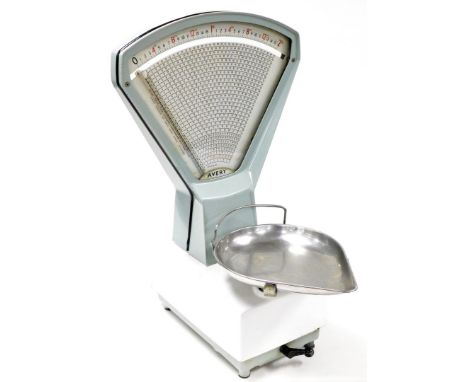 A set of Avery kitchen scales, with blue enamelled dial on a white base, 60cm high, 37cm deep.