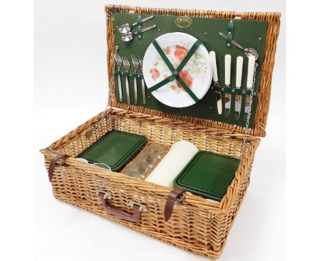An Optima wicker picnic hamper, with floral plastic plates, flasks and lunch boxes, the basket 57cm x 35cm. 