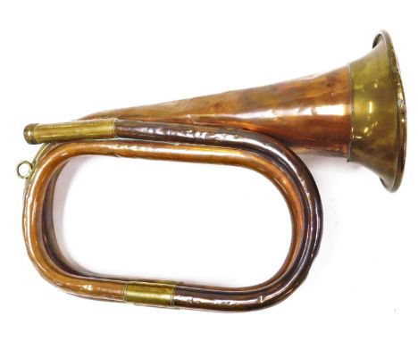 A brass bugle, stamped Premier. 