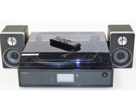 A Neostar professional belt drive turn table with cassette radio CD recorder and USB encoding to computer, five in one system
