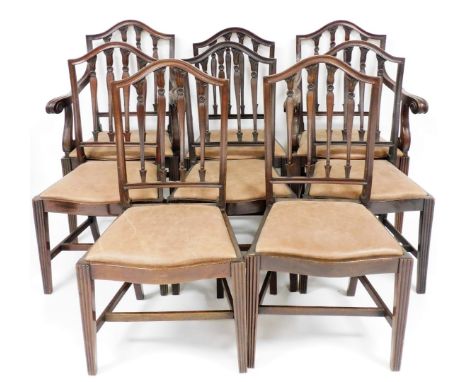 A set of eight Chippendale style dining chairs, each with mahogany arrow and carved back, with drop in leather upholstered se